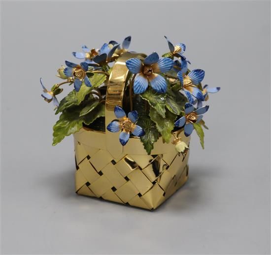 A modern Cartier? silver gilt and enamel basket of flowers table ornament, signed Schrote?, with Cartier box, height 85mm.